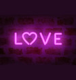 neon love word on the wall vector image vector image
