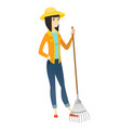 young asian farmer holding gardening rake vector image