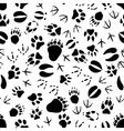black and white animal tracks pattern vector image