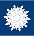 white snowflake on a blue background vector image