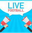 male hand holding megaphone with live football vector image vector image