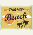 grunge retro metal sign this way to the beach vector image